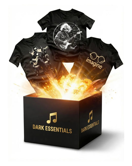 Three black t-shirts with artistic designs on a 'Dark Essentials' box.